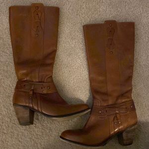 Knee high leather heeled boots